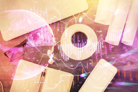 Multi exposure of forex graph drawing over desktop background with computer. Concept of financial analysis. Top view.の写真素材