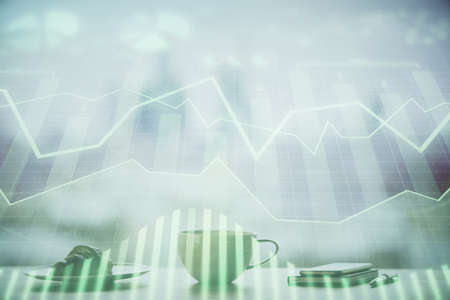 Double exposure of forex chart over coffee cup background in office. Concept of financial analysis...