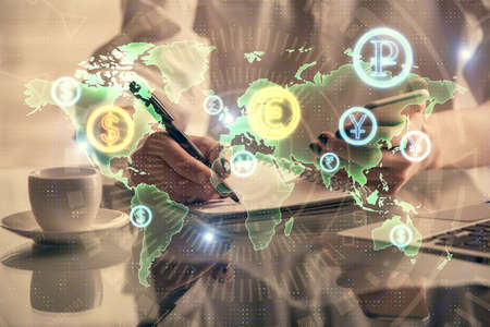 Double exposure of financial graph sketch hologram and woman holding and using a mobile device....
