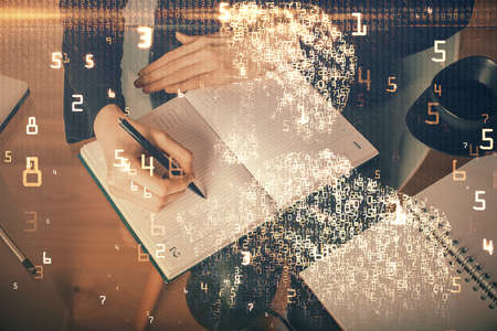 Tech theme hologram over womans hands taking notes background. Concept of hightech. Double exposure