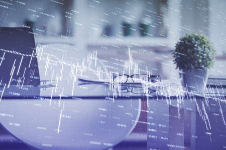 Double exposure of financial graph drawing and office interior background. Concept of stock market.