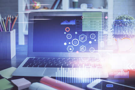 Double exposure of desktop with personal computer on background and tech theme drawing. Concept of...
