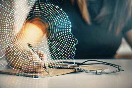 Multi exposure of womans writing hand on background with brain hologram. Concept of brainstorming.
