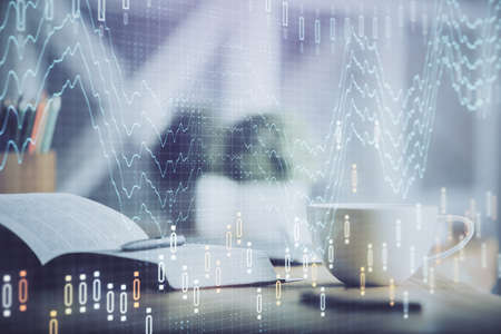 Multi exposure of forex graph drawing and desktop with coffee and items on table background. Concept...