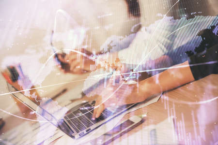 Multi exposure of woman hands typing on computer and financial chart hologram drawing. Stock market...