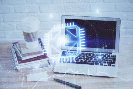 Double exposure of desktop computer and technology theme hologram. Concept of software development.