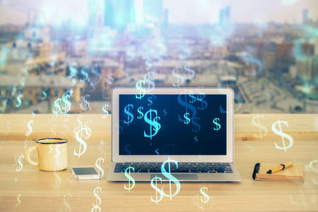 Financial graph colorful drawing and table with computer on background. Double exposure. Concept of international markets.の写真素材