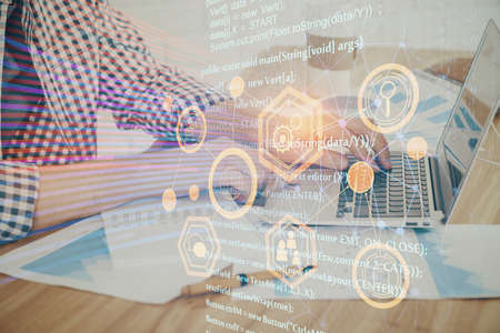 Businessman working on Laptop with technology theme drawing. Concept of big data. Double exposure.