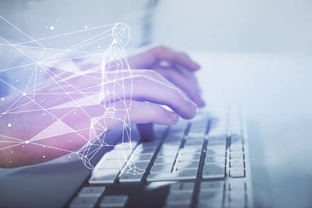 Start up drawings with businessman working on computer on background. Teamwork concept. Double exposure.の写真素材