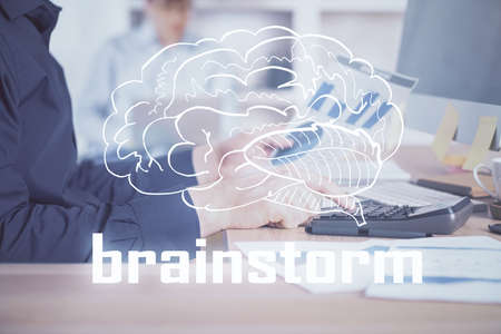 Start up drawings with businessman working on computer on background. Teamwork concept. Double exposure.の写真素材
