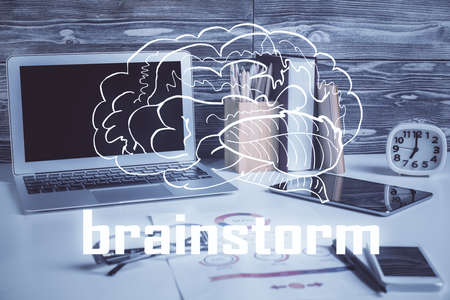 Desktop computer background in office and start up theme hologram drawing. Double exposure. Startup...