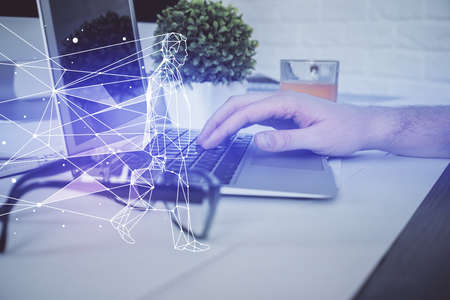 Start up drawings with businessman working on computer on background. Teamwork concept. Double exposure.の写真素材