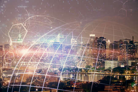 Map and data theme hologram on city view with skyscrapers background double exposure. International technology in business concept.の写真素材