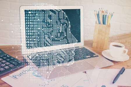 Double exposure of desktop with computer and brain drawing hologram. Artificial intelligence...