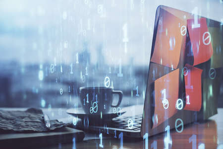 Double exposure of laptop computer and technology theme hologram. Concept of freelance work.