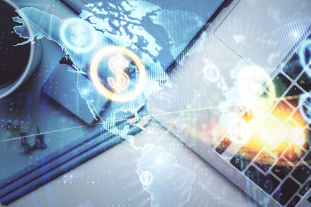 Double exposure of forex graph drawing over desktop background with computer. Concept of financial...