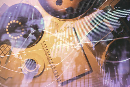 Multi exposure of forex chart drawing and work table top veiw. Concept of financial analysis.