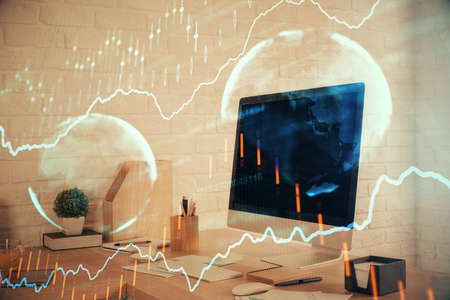 Double exposure of stock market graph drawing and office interior background. Concept of financial...