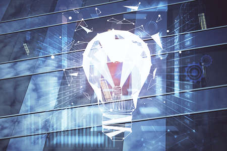Multi exposure of bulb hologram drawing and cityscape background. Concept of idea.の写真素材