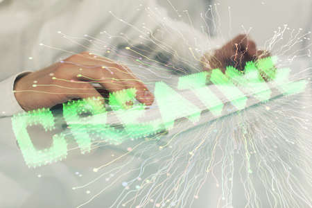 Start up drawings with businessman working on computer on background. Teamwork concept. Double...