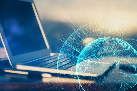 Computer on desktop with social network hologram. Multi exposure. Concept of international people...