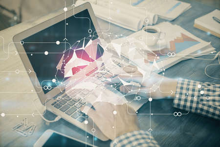 Man typing on keyboard background with brain hologram. Concept of big Data.