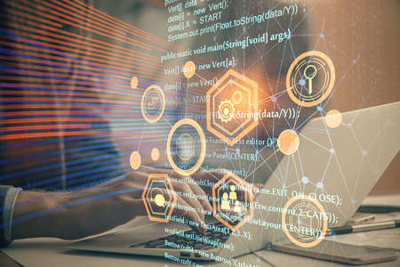 Businessman with computer background with technology theme hologram. Concept of big data. Double...