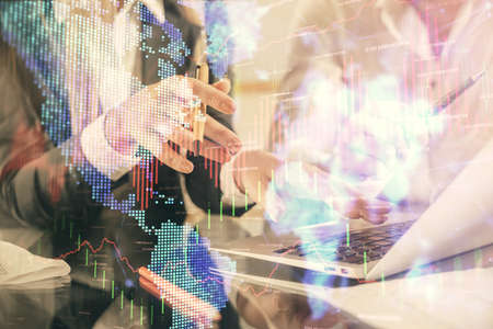 Double exposure of man and woman working together and forex chart hologram. Business concept....