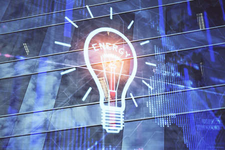 Multi exposure of bulb hologram drawing and cityscape background. Concept of idea.の写真素材