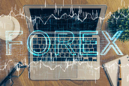Multi exposure of chart and financial info and work space with computer background. Concept of international online trading.の写真素材
