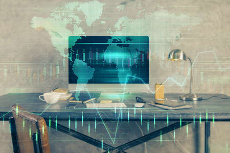 Double exposure of forex graph and work space with computer. Concept of international online trading.の写真素材