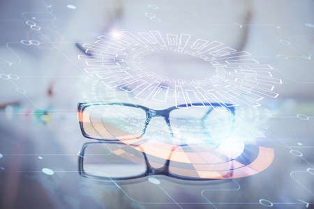 Double exposure of writing hand on background with data solution technology hologram. Ai concept.の写真素材