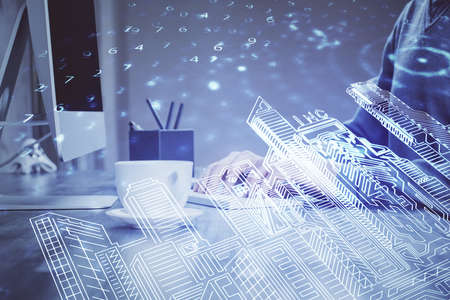 High tech city drawing with businessman working on computer on background. Smartcity concept. Double...