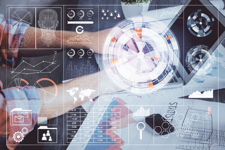 Multi exposure of technology hologram with man working on computer background. Concept of big data.