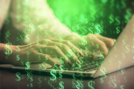 Double exposure of businesswoman hands typing on computer and forex chart hologram drawing....