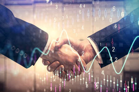 Double exposure of forex graph hologram and handshake of two men. Stock market concept.