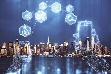 Double exposure of technology theme hologram and cityscape background. Concept of Hightech.の写真素材