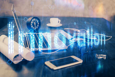 Double exposure of table with computer on background and data theme drawing. Concept of innovation.