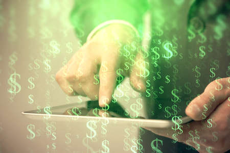 Multi exposure of man's hands holding and using a phone and financial chart drawing. Market analysis concept.の写真素材