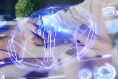 Education theme hologram over woman's hands writing background. Concept of study. Double exposureの写真素材