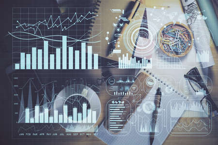 Double exposure of forex graph drawing and work table top veiw. Concept of financial analysis.の写真素材
