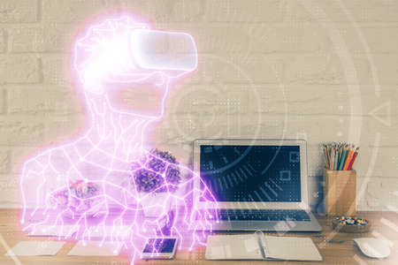 Computer on desktop with AR theme icon. Multi exposure. Concept of augmented reality.