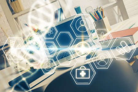 Desktop computer background and DNA drawing. Double exposure. Science concept.
