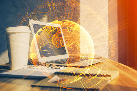Computer on desktop with social network hologram. Multi exposure. Concept of international people...