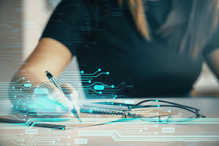 Multi exposure of woman's writing hand on background with data technology hud. Concept of...