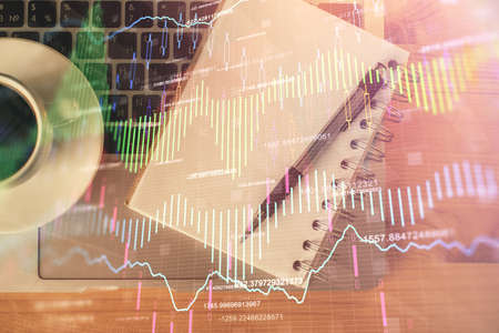 Multi exposure of forex chart drawing and work table top veiw. Concept of financial analysis.