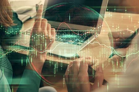 Double exposure of man and woman working together and forex chart hologram. Business concept....