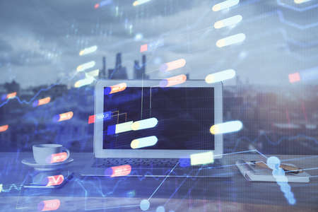 Double exposure of computer and technology theme hologram. Concept of freelance work.の写真素材