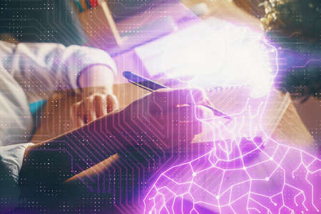 AR hologram over woman's hands taking notes background. Concept of augmented reality. Multi exposure