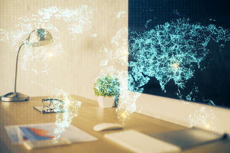 Computer on desktop with social network hologram. Multi exposure. Concept of international people connections.の写真素材